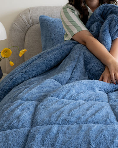 Detail shot of the Morgan and Reid All Seasons Snuggle Fleece Smokey Blue Comforter Set fabric and finish