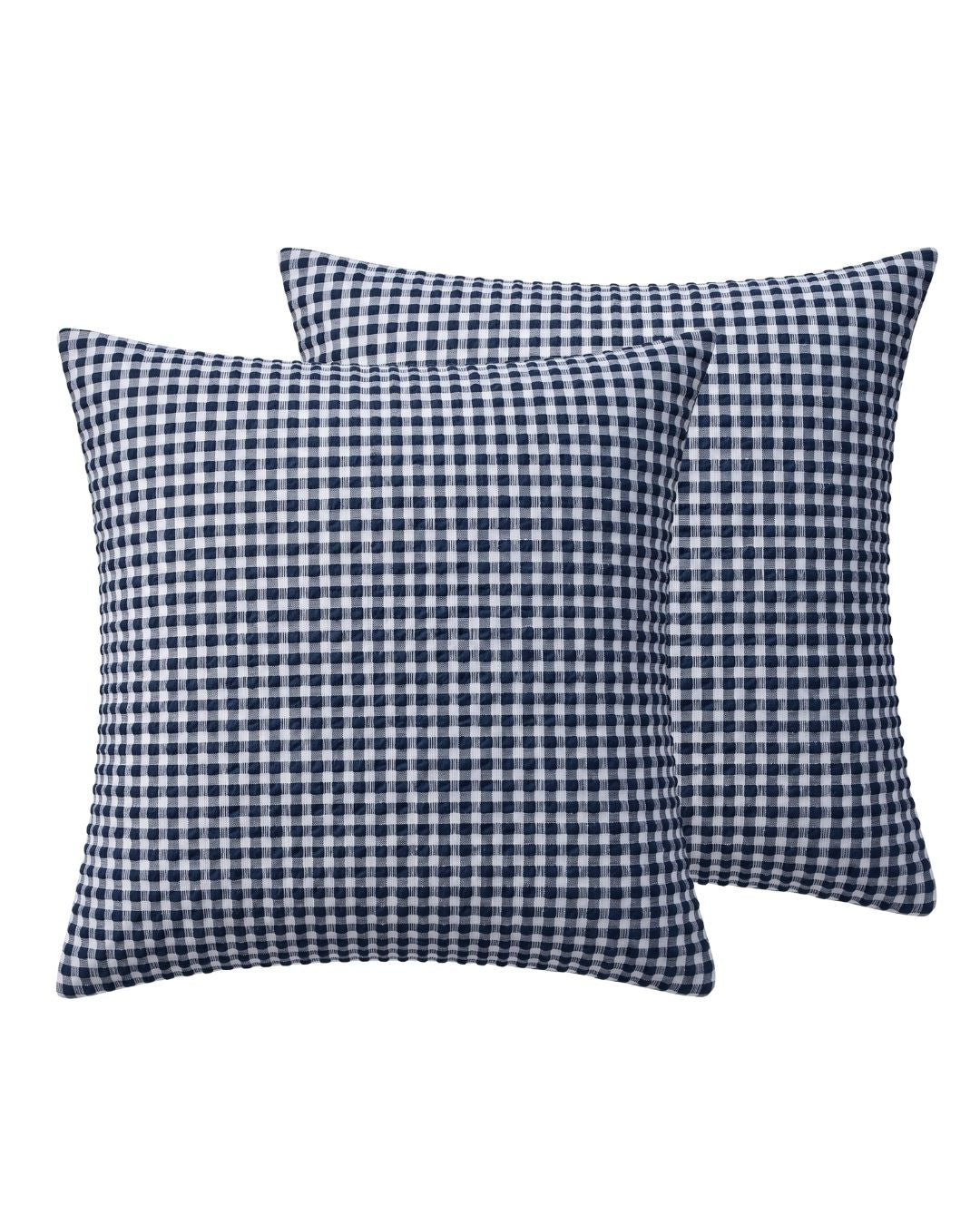 Two square throw pillows with a navy blue and white gingham checkered pattern, displayed against a solid white background.