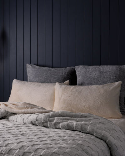 Close-up of the Morgan and Reid Checkered Silver Snuggle Fleece Pillowcase Pair showing fabric texture