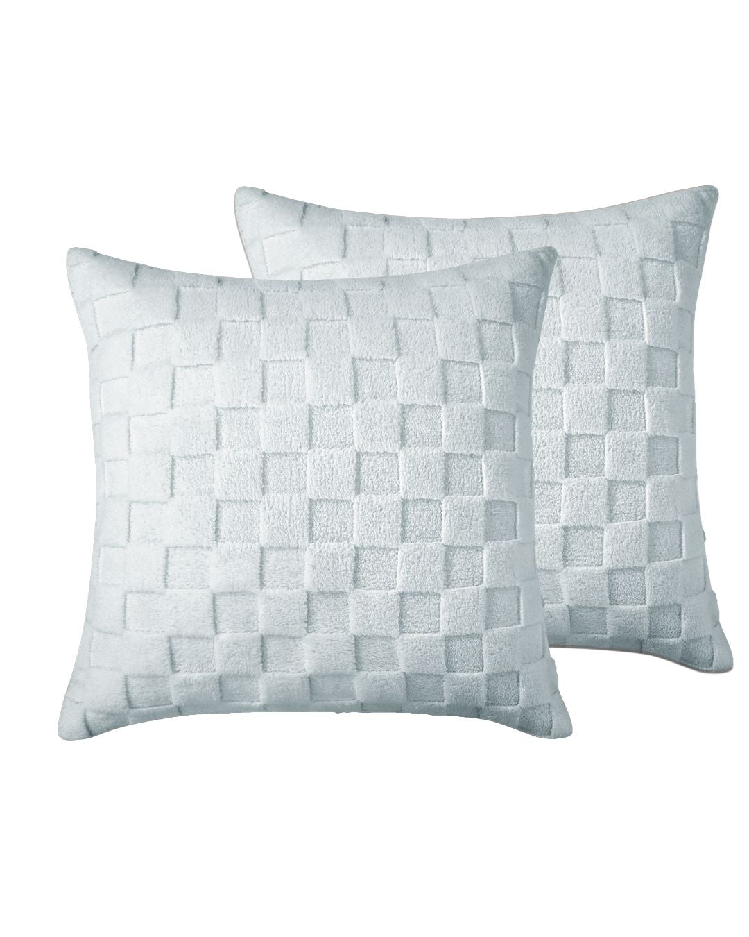 Two woven patterned pillows on a white background