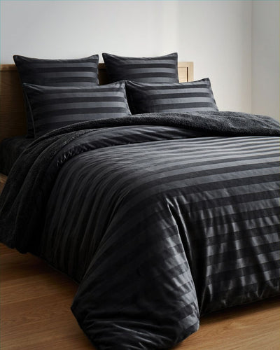 Close-up of the Morgan and Reid Black Velvet Stripe Snuggle Fleece European Pillowcase Pair showing fabric texture