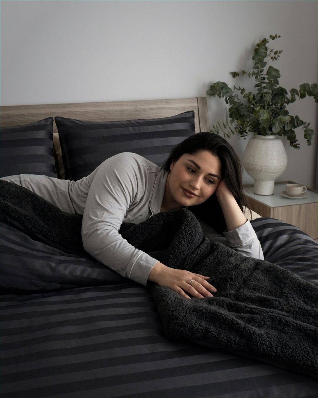 Morgan and Reid Black Velvet Stripe Snuggle Fleece Comforter Set in a cosy bedroom lifestyle setting