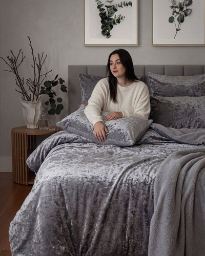 Morgan and Reid Silver Velvet Crushed Snuggle Fleece Comforter Set folded to show depth and plush texture