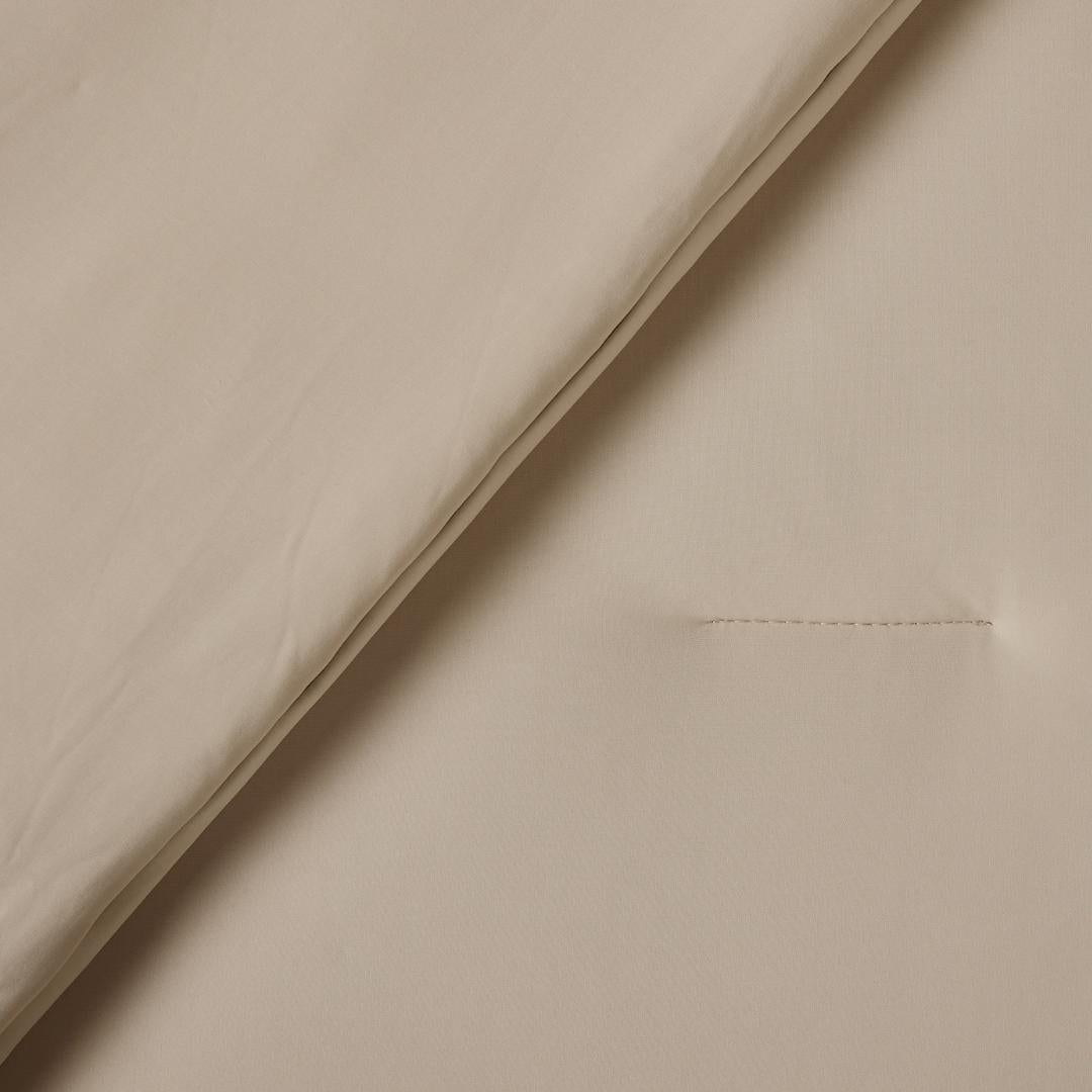 Lightweight doeskin cooling comforter with matching pillowcases.