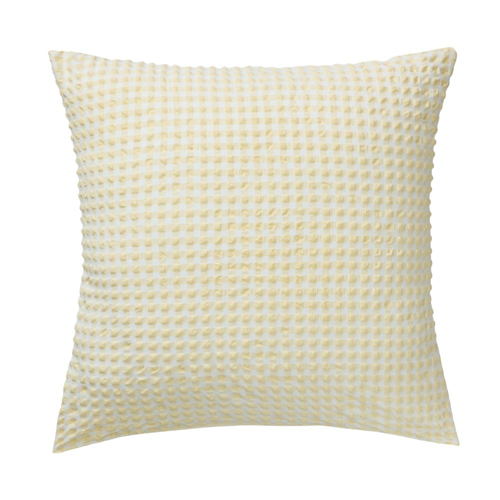 Morgan and Reid Gingham Lemon Butter European Pillowcase Pair on a styled bed with matching comforter