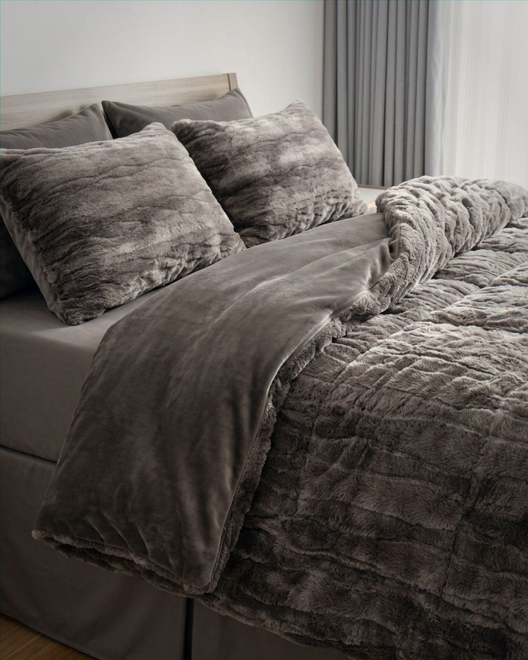 Morgan and Reid Deep Cocoa Snuggle Fleece Rabbit Fur European Pillowcase Pair on bed with coordinating bedding