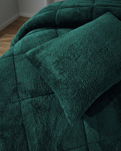 Morgan and Reid Forest Green Snuggle Fleece Comforter Set folded to show depth and plush texture