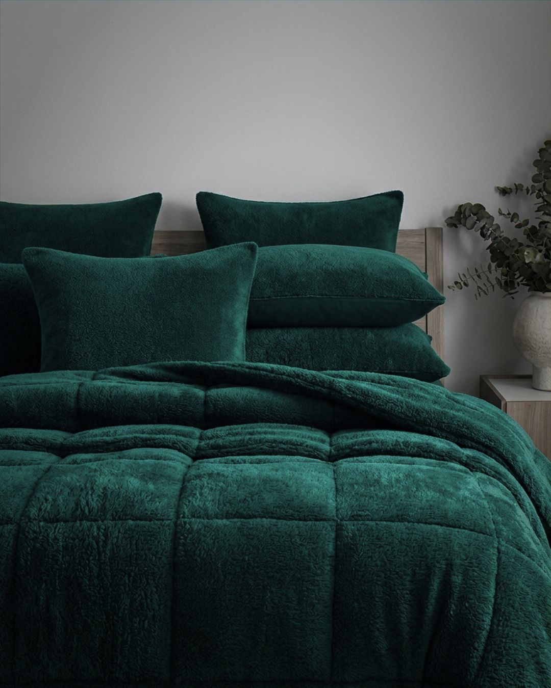 Morgan and Reid Forest Snuggle Fleece European Pillowcase Pair on bed with coordinating bedding