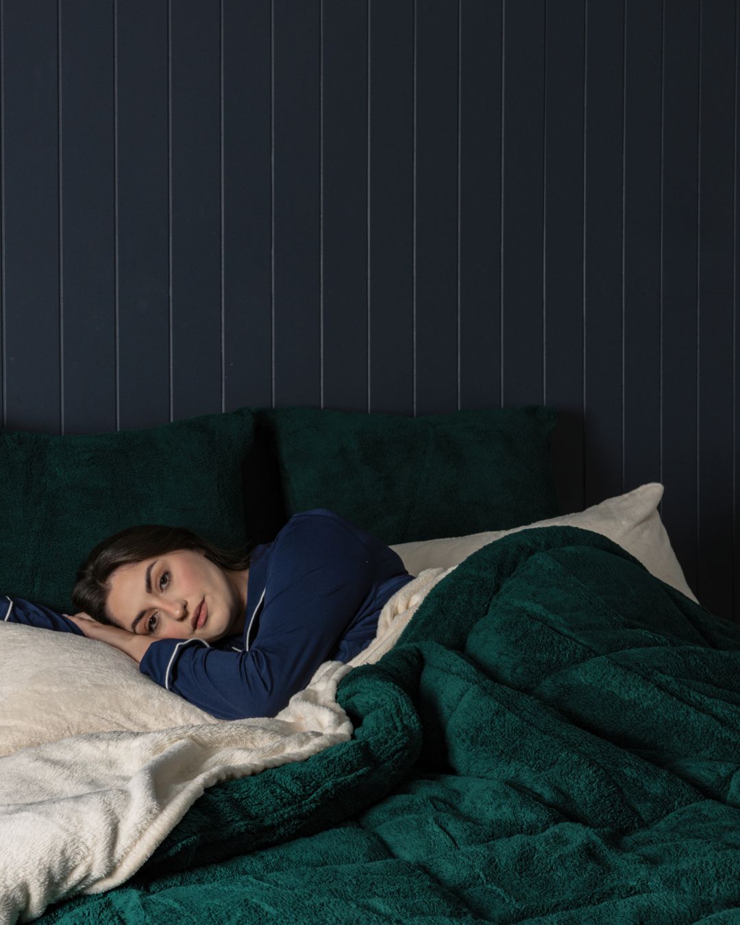 Detail shot of the Morgan and Reid Forest Green Snuggle Fleece Comforter Set fabric and finish
