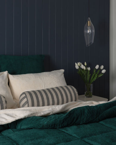 Morgan and Reid Forest Green Snuggle Fleece Comforter Set in a cosy bedroom lifestyle setting