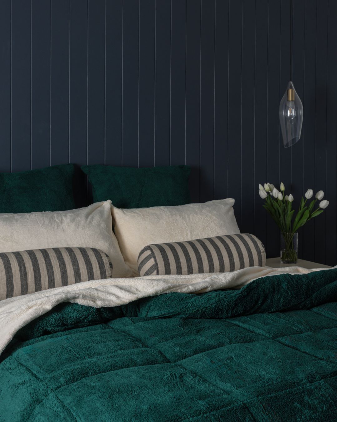 Morgan and Reid Forest Green Snuggle Fleece Comforter Set on a bed with matching pillowcases