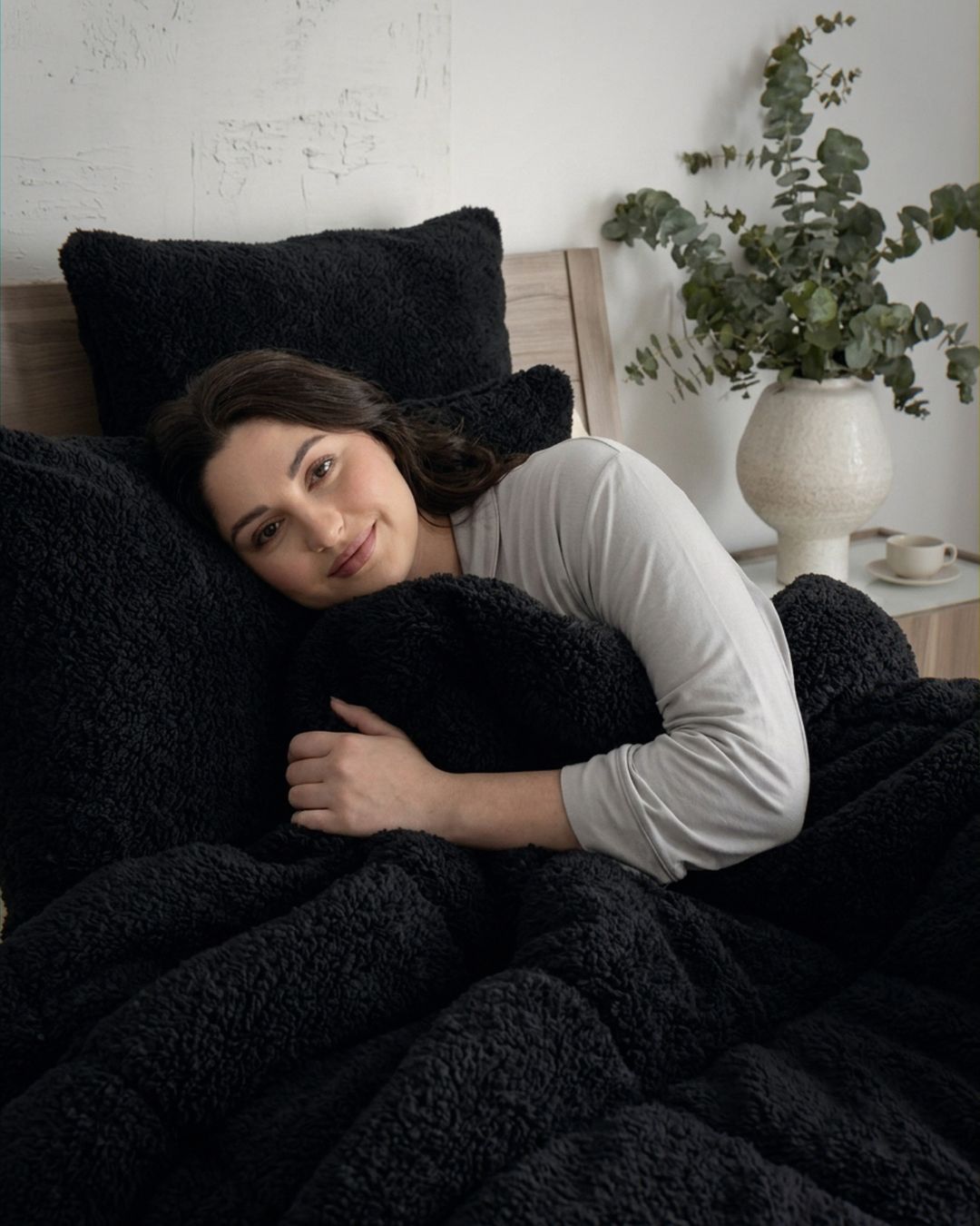 Detail shot of the Morgan and Reid Black Snuggle Fleece Comforter Set fabric and finish