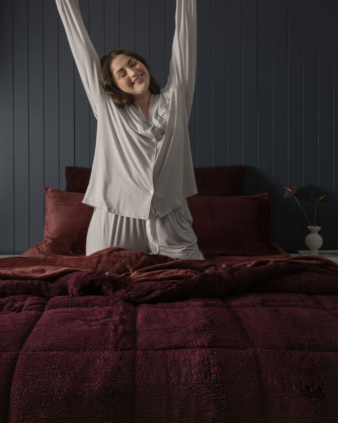 Morgan and Reid Burgundy Black Snuggle Fleece Comforter Set in a cosy bedroom lifestyle setting