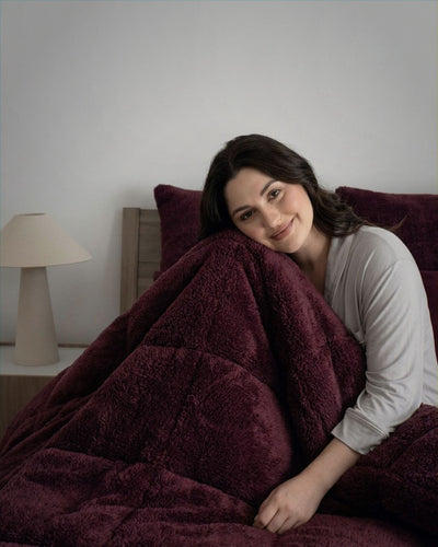 Morgan and Reid Burgundy Black Snuggle Fleece Comforter Set folded to show depth and plush texture
