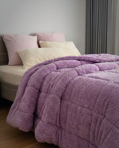 Overhead view of the Morgan and Reid Calm Lavender Snuggle Fleece Comforter Set on a made bed