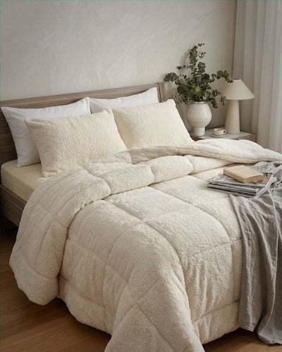 Morgan and Reid Ivory Snuggle Fleece Comforter Set in a cosy bedroom lifestyle setting