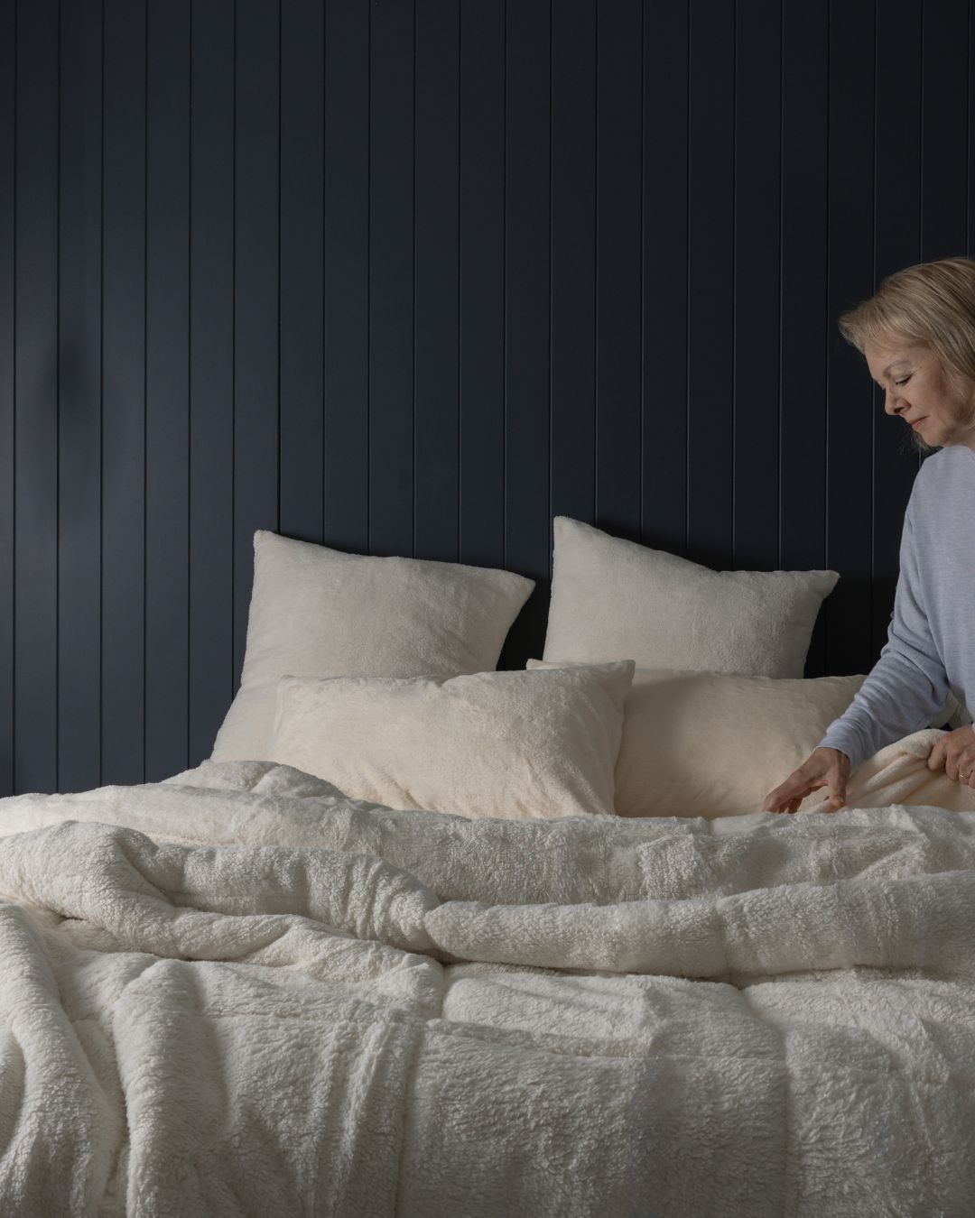 Detail shot of the Morgan and Reid Ivory Snuggle Fleece Comforter Set fabric and finish