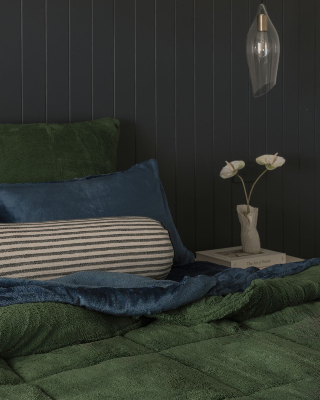 Morgan and Reid Jungle Snuggle Fleece European Pillowcase Pair on bed with coordinating bedding