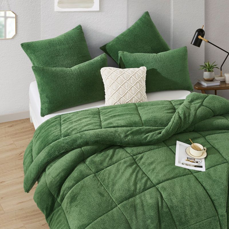 The Morgan and Reid Jungle Snuggle Fleece Pillowcase Pair features a rectangular green design with plush texture and slightly rounded corners, crafted from soft snuggle fleece, shown on a plain white background.