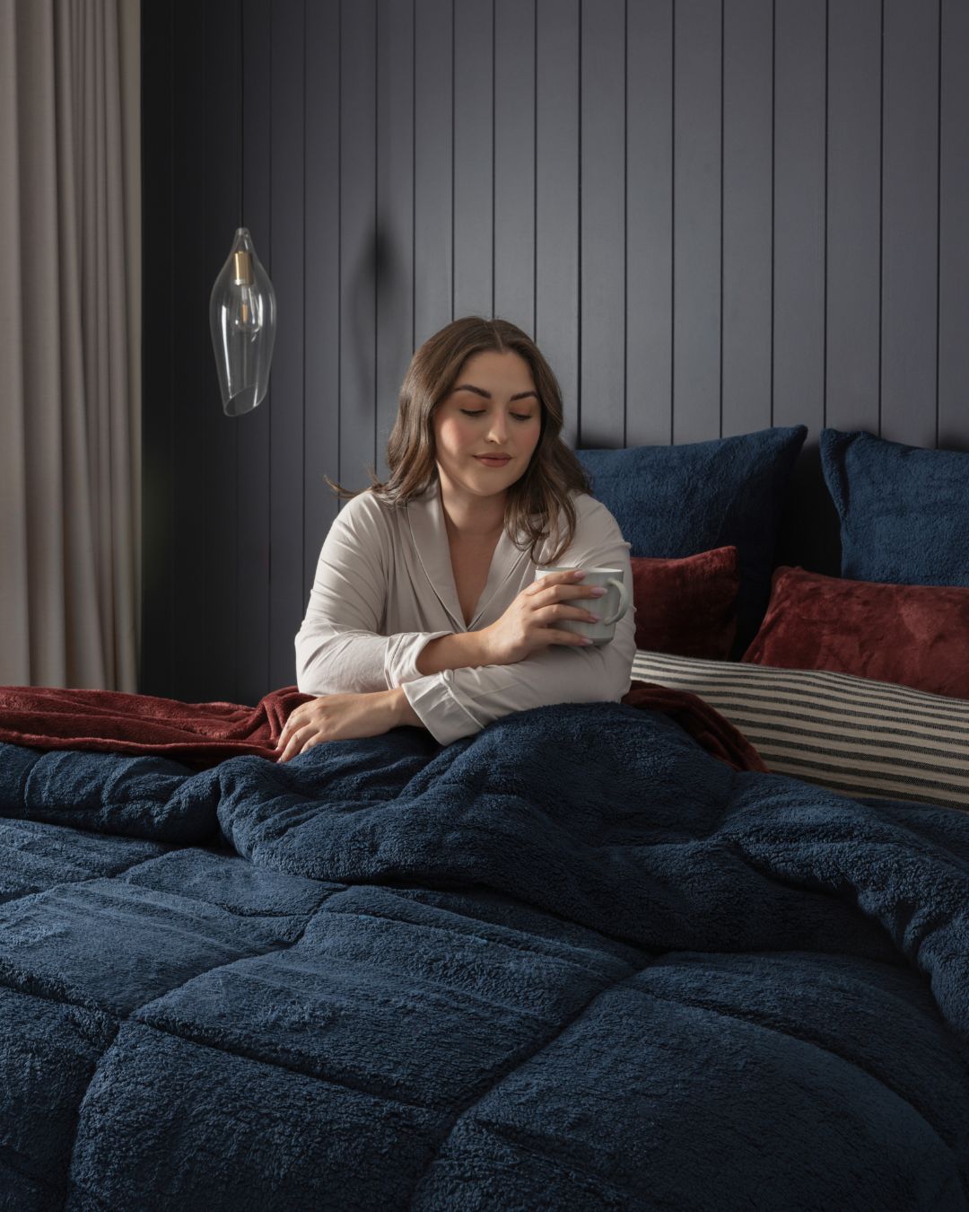 Detail shot of the Morgan and Reid Midnight Blue Snuggle Fleece Comforter Set fabric and finish