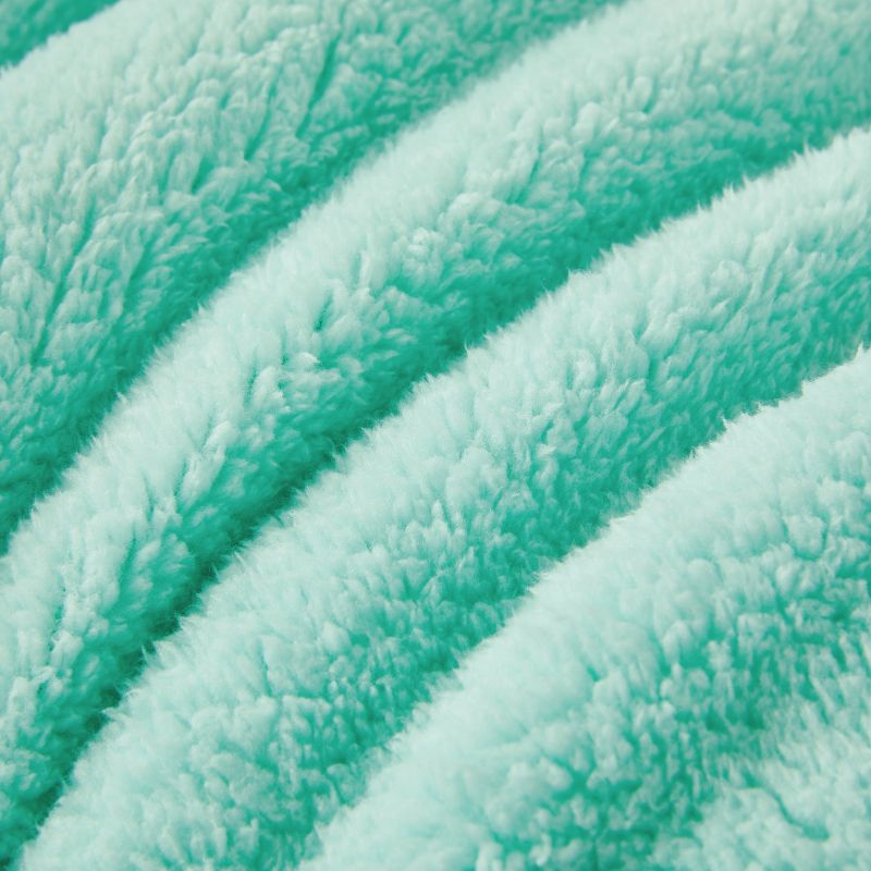 The Morgan and Reid Mint Snuggle Fleece European Pillowcase Pair features ultra-soft, textured fleece in light turquoise, shown against a white background.