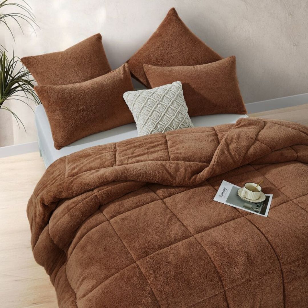 The Morgan and Reid Mocha Snuggle Fleece European Pillowcase Pair features a square design with a soft, textured brown fleece surface, shown against a white background.