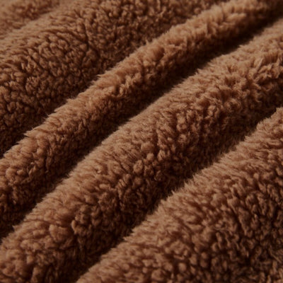The Morgan and Reid Mocha Snuggle Fleece European Pillowcase Pair features a square design with a soft, textured brown fleece surface, shown against a white background.