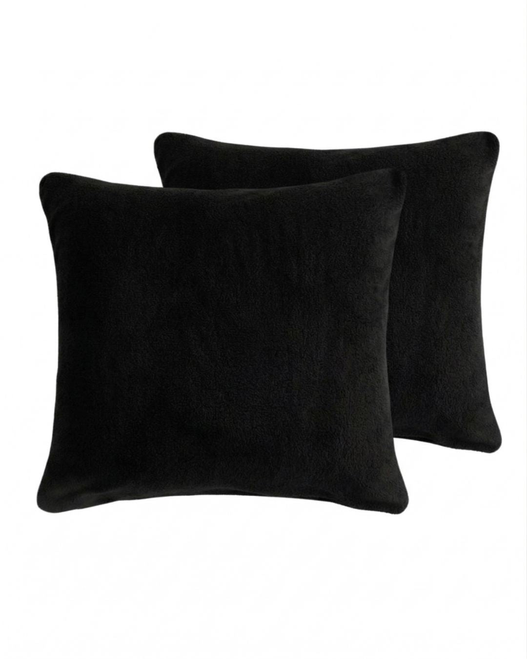 Morgan and Reid Black Snuggle Fleece European Pillowcase Pair on a styled bed with matching comforter