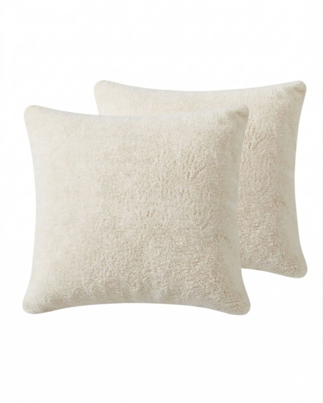 Morgan and Reid Ivory Snuggle Fleece European Pillowcase Pair on a styled bed with matching comforter