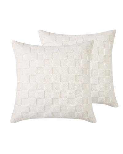 Morgan and Reid Checkered Cream Snuggle Fleece European Pillowcase Pair on a styled bed with matching comforter