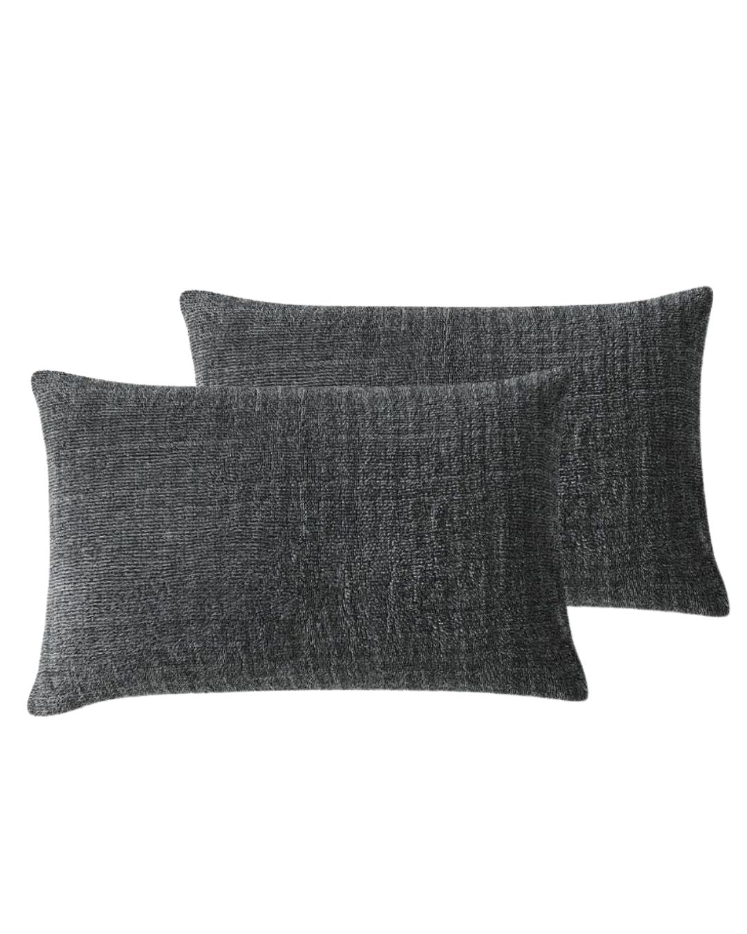 Morgan and Reid Black White Snuggle Fleece Pillowcase Pair on a styled bed with matching comforter
