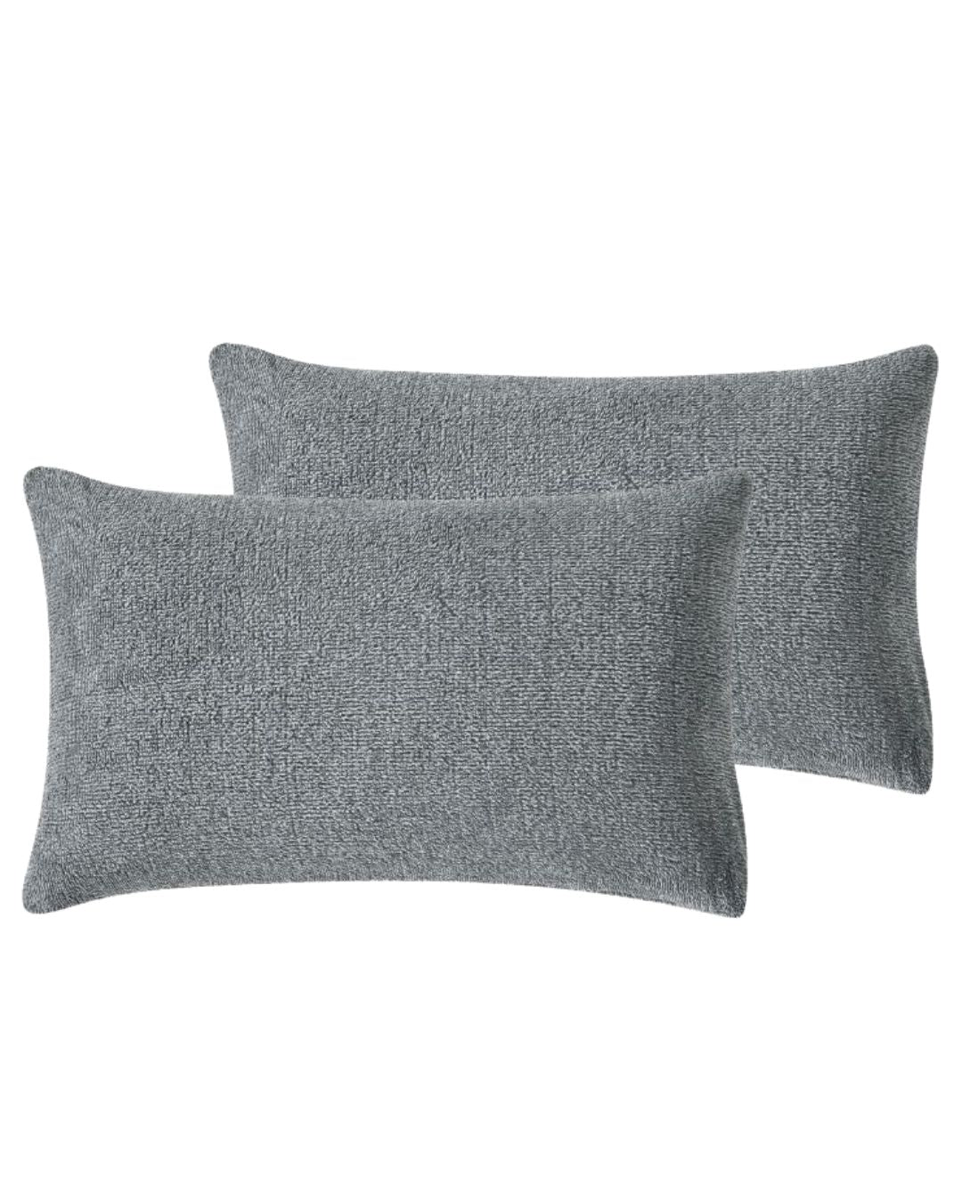 Morgan and Reid Grey Spec Snuggle Fleece Pillowcase Pair on a styled bed with matching comforter
