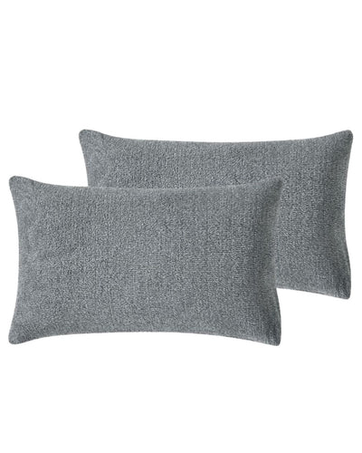 Morgan and Reid Grey Spec Snuggle Fleece Pillowcase Pair on a styled bed with matching comforter