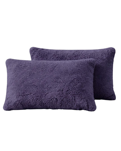 Morgan and Reid Mulberry Purple Snuggle Fleece Pillowcase Pair on a styled bed with matching comforter