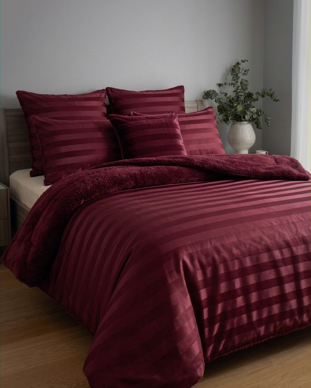 Close-up of the Morgan and Reid Cherry Red Velvet Stripe Snuggle Fleece European Pillowcase Pair showing fabric texture