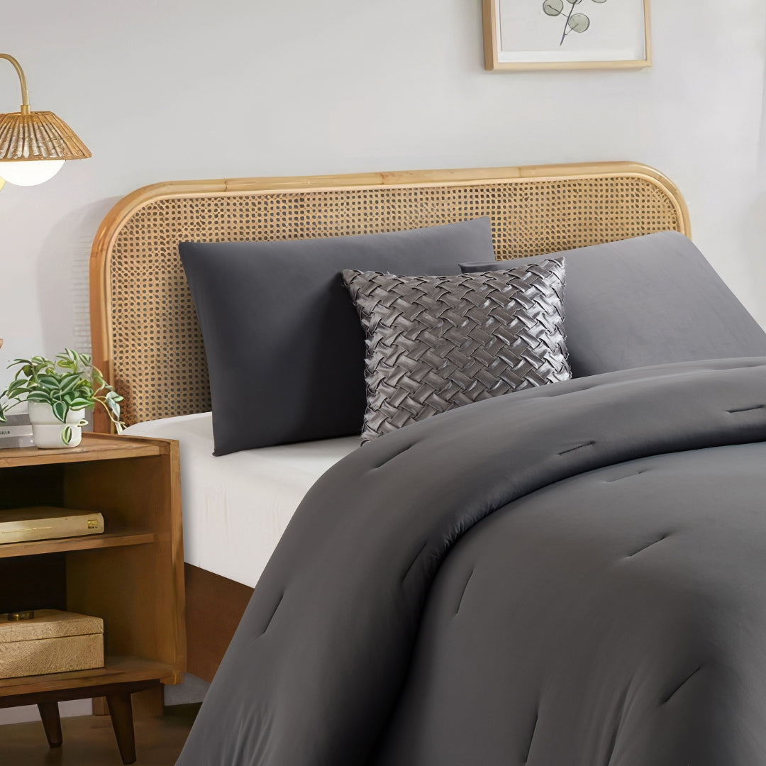 Lightweight colling comforter with matching pillowcases in deep grey.