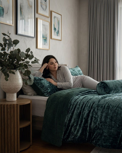 Morgan and Reid Sage Velvet Crushed Snuggle Fleece Comforter Set in a cosy bedroom lifestyle setting