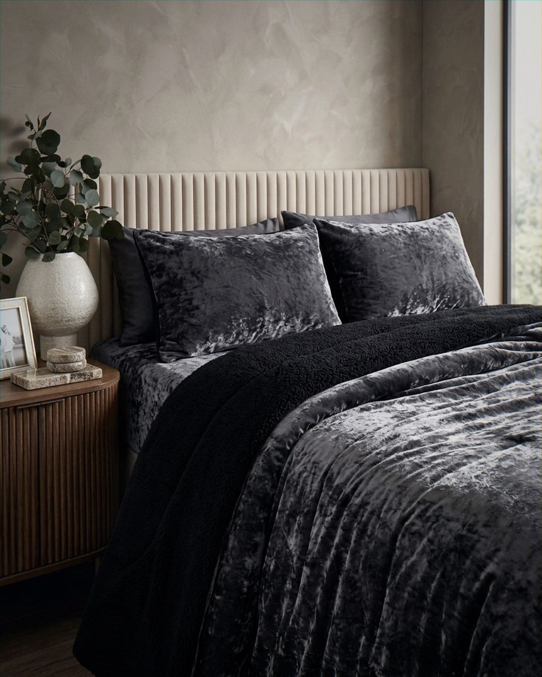 Morgan and Reid Black Velvet Crushed Snuggle Fleece Pillowcase Pair on bed with coordinating bedding
