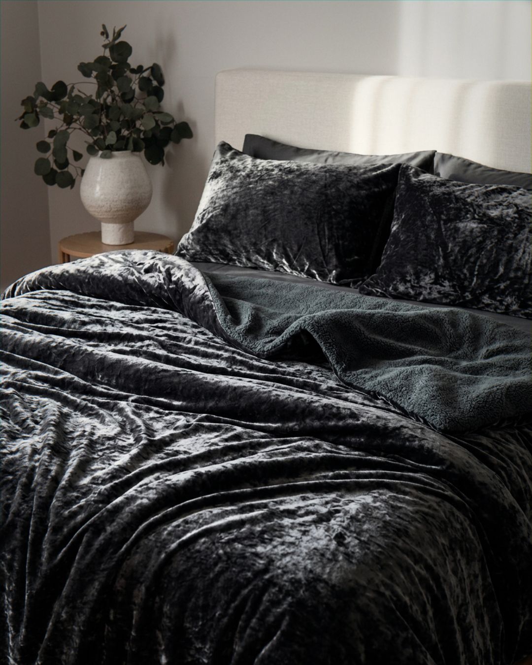 Morgan and Reid Black Velvet Crushed Snuggle Fleece Comforter Set in a cosy bedroom lifestyle setting