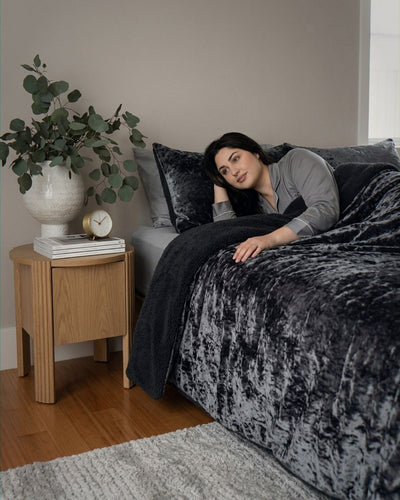 Morgan and Reid Black Velvet Crushed Snuggle Fleece Comforter Set folded to show depth and plush texture