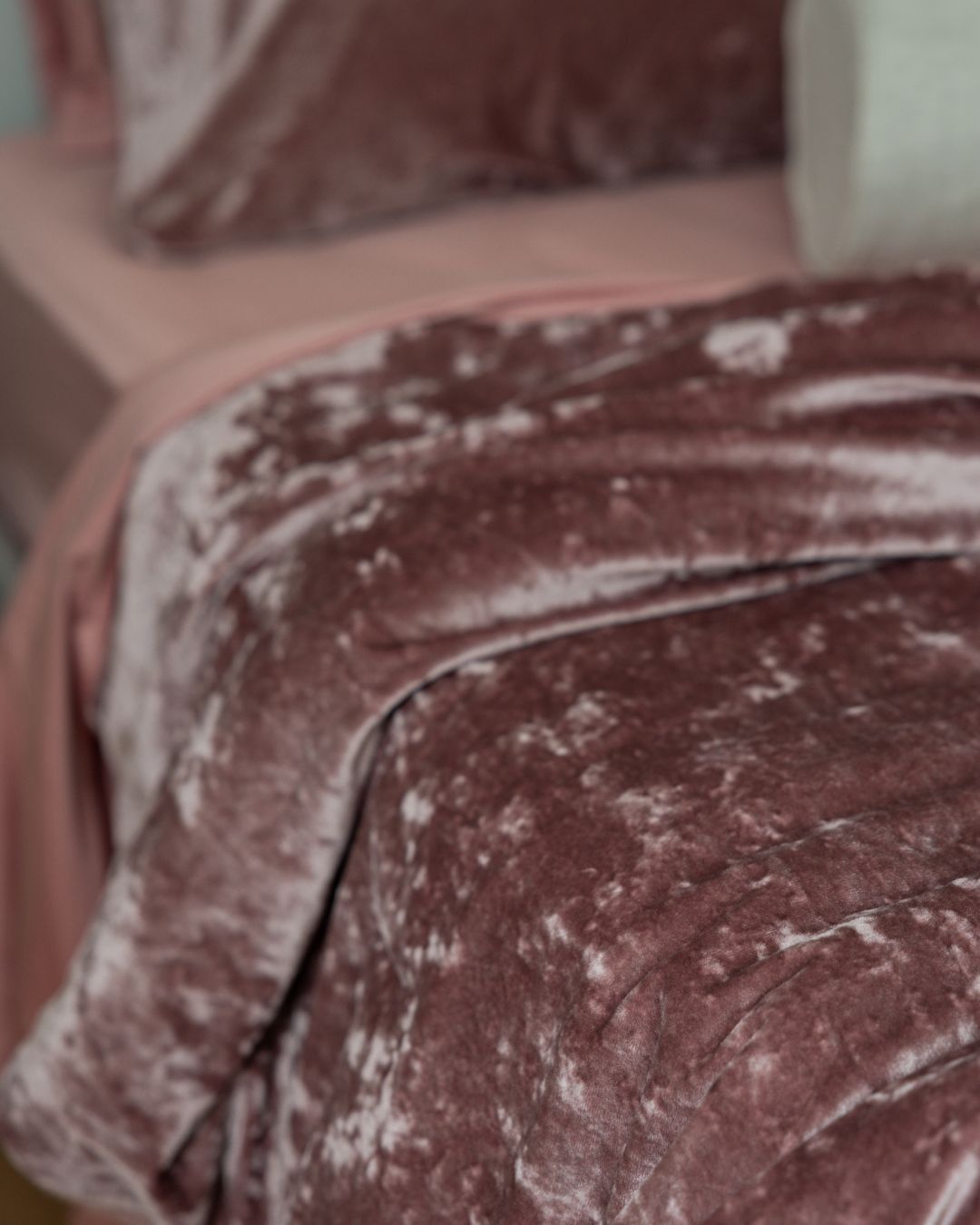 Close-up of the Morgan and Reid Shell Pink Velvet Crushed Snuggle Fleece European Pillowcase Pair showing fabric texture