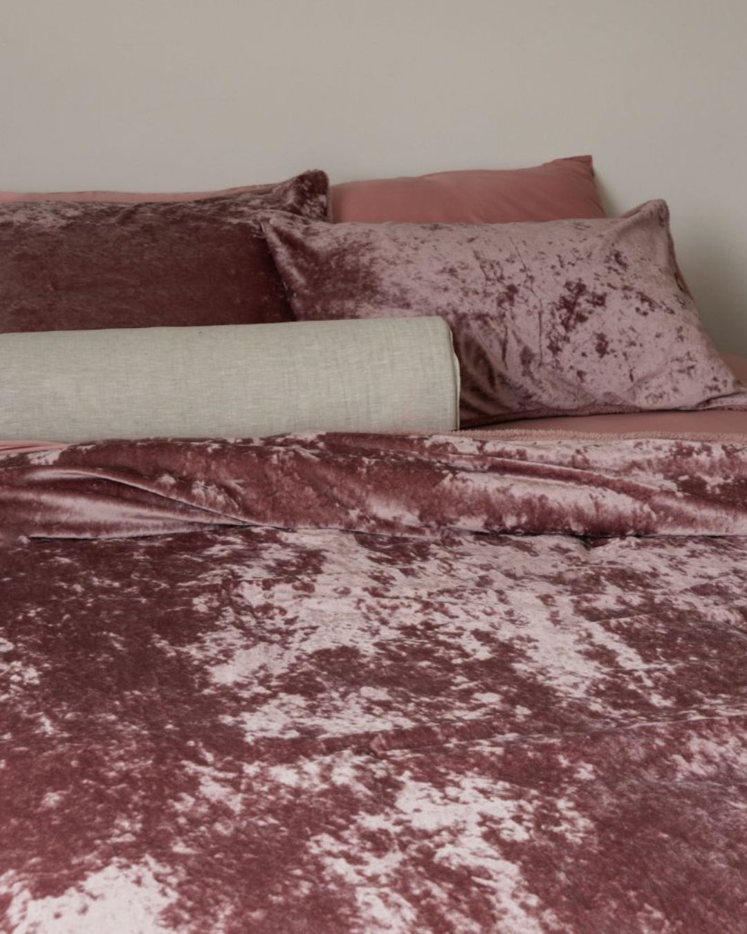 Close-up of the Morgan and Reid Shell Pink Velvet Crushed Snuggle Fleece Pillowcase Pair showing fabric texture