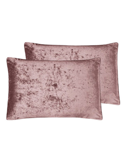 Morgan and Reid Shell Pink Velvet Crushed Snuggle Fleece Pillowcase Pair on a styled bed with matching comforter