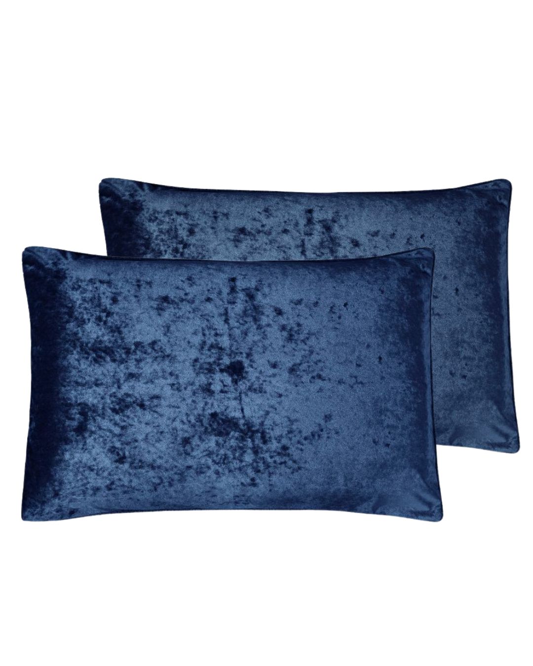 Morgan and Reid Navy Velvet Crushed Snuggle Fleece Pillowcase Pair on a styled bed with matching comforter