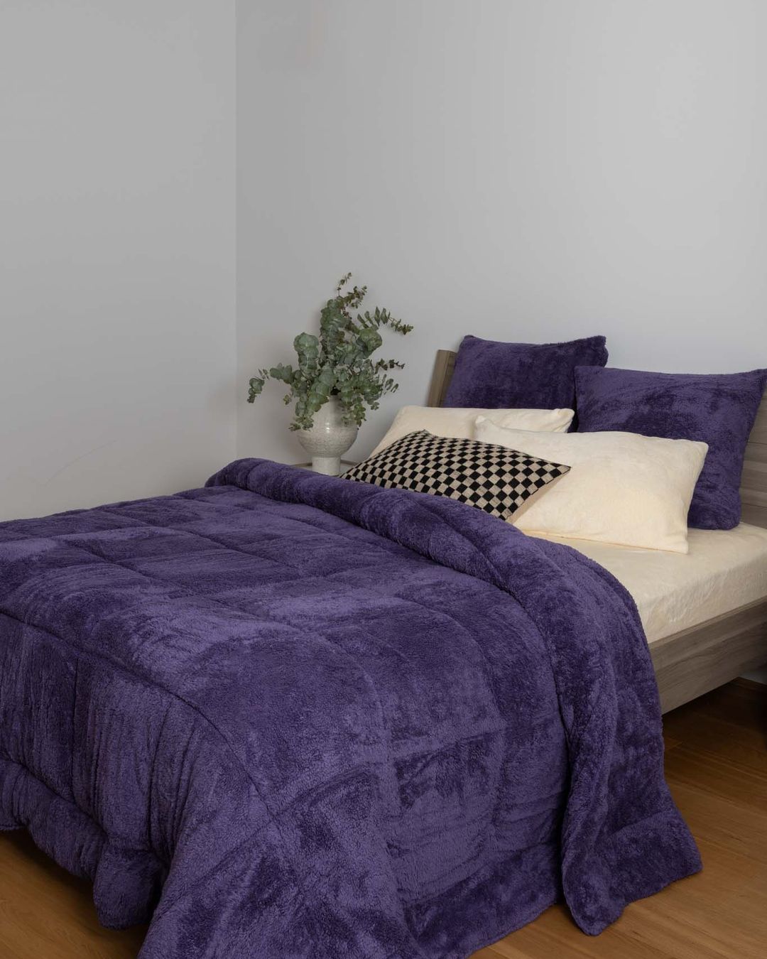Morgan and Reid Mulberry Purple Snuggle Fleece Pillowcase Pair on bed with coordinating bedding