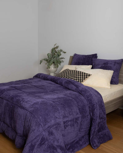 Morgan and Reid Mulberry Purple Snuggle Fleece Pillowcase Pair on bed with coordinating bedding