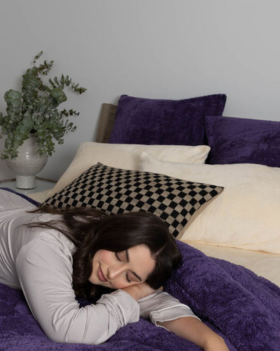 Morgan and Reid Mulberry Purple Snuggle Fleece Comforter Set folded to show depth and plush texture