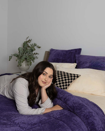 Morgan and Reid Mulberry Purple Snuggle Fleece Comforter Set in a cosy bedroom lifestyle setting