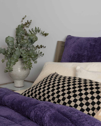 Close-up of the Morgan and Reid Mulberry Purple Snuggle Fleece Pillowcase Pair showing fabric texture
