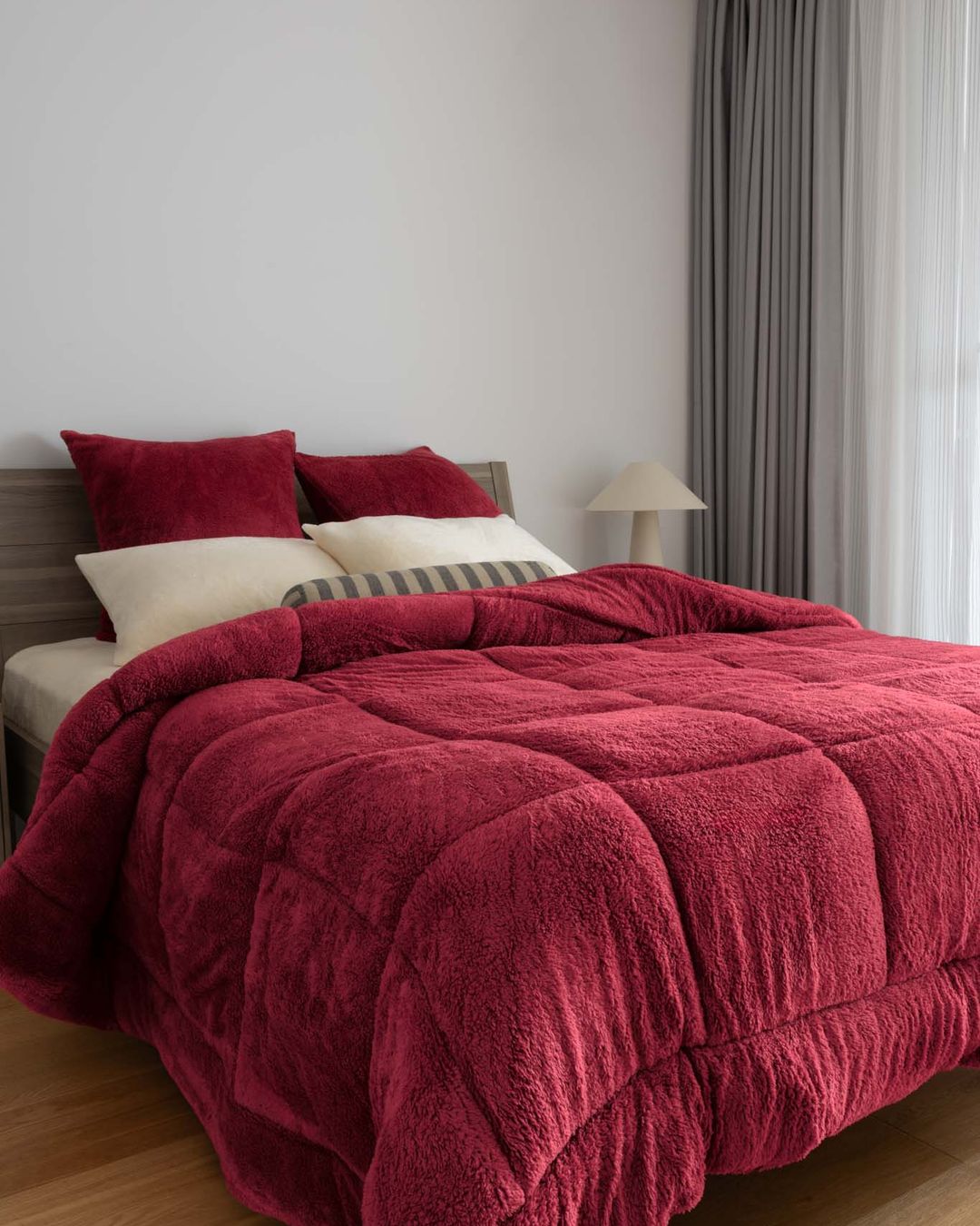 Detail shot of the Morgan and Reid Rhubarb Snuggle Fleece Pillowcase Pair on pillows